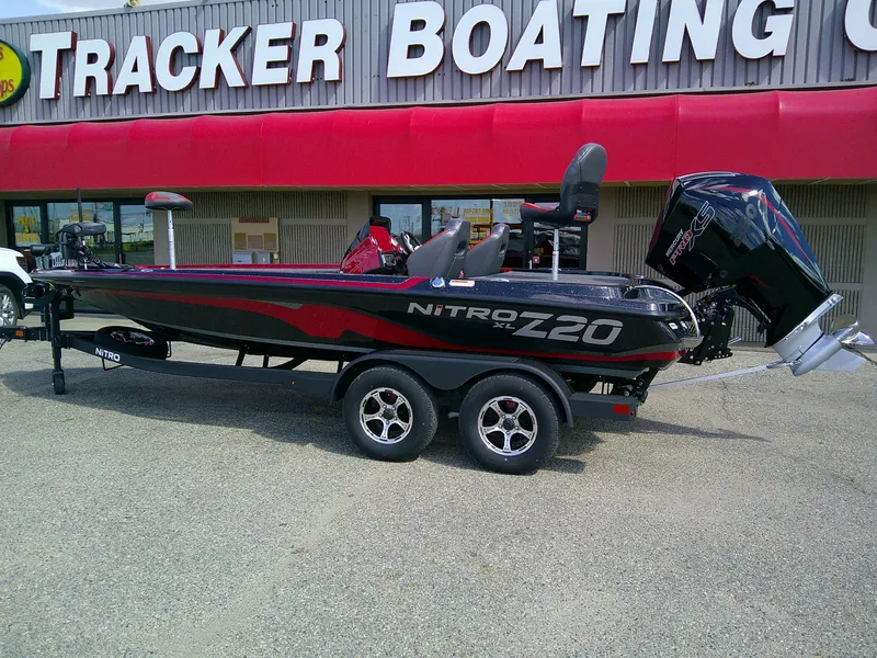 Slide: The Image of 2025 Nitro Z20 XL boat displayed at Tracker Boating Center. - 2