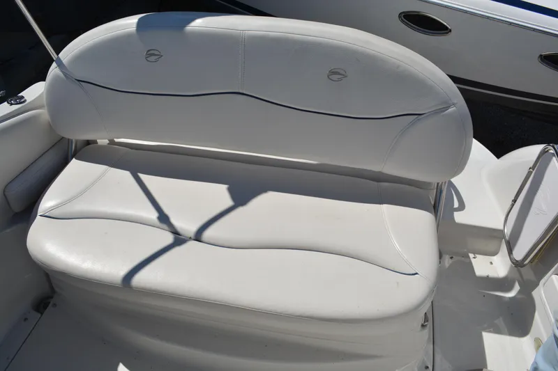 Slide: The Image of White seating on 2004 Crownline 270 CR boat, showcasing comfortable design and upholstery. - 20