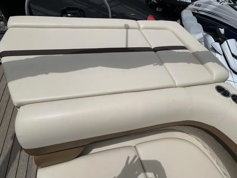 Slide: The Image of Beige seating on 2022 Lowe 190 SS boat, featuring cup holders and sleek design. - 11