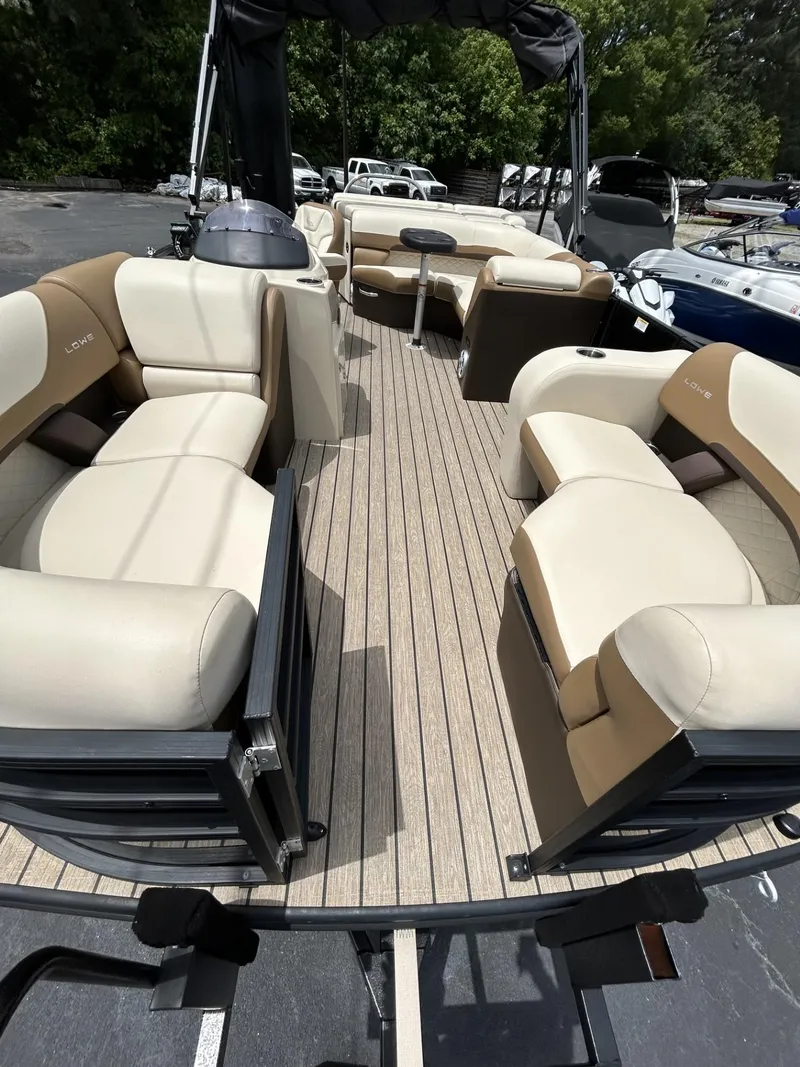 Slide: The Image of 2022 Lowe 190 SS boat with spacious seating and modern design. - 12