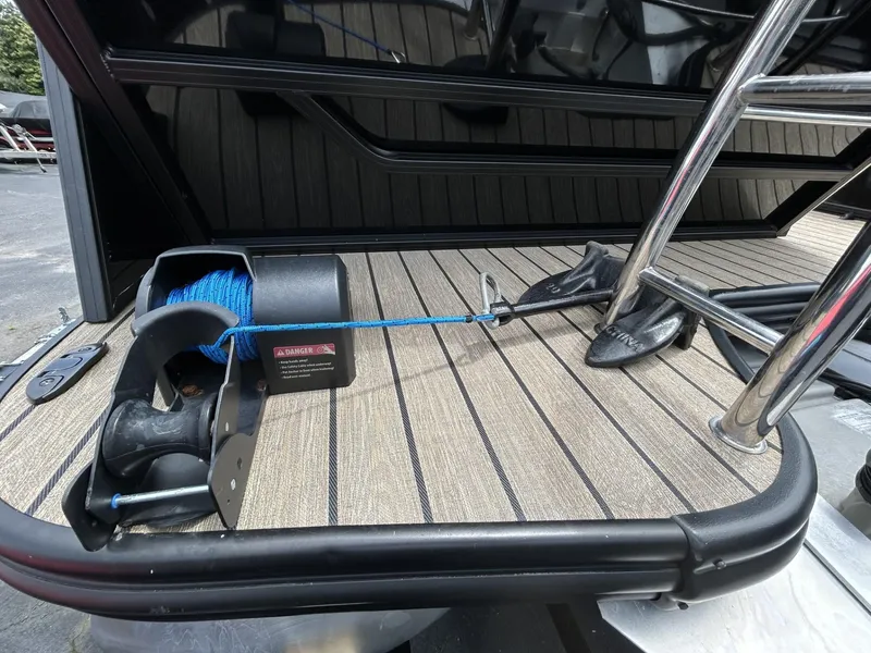 Slide: The Image of 2022 Lowe 190 SS boat deck with anchor and blue rope. - 14