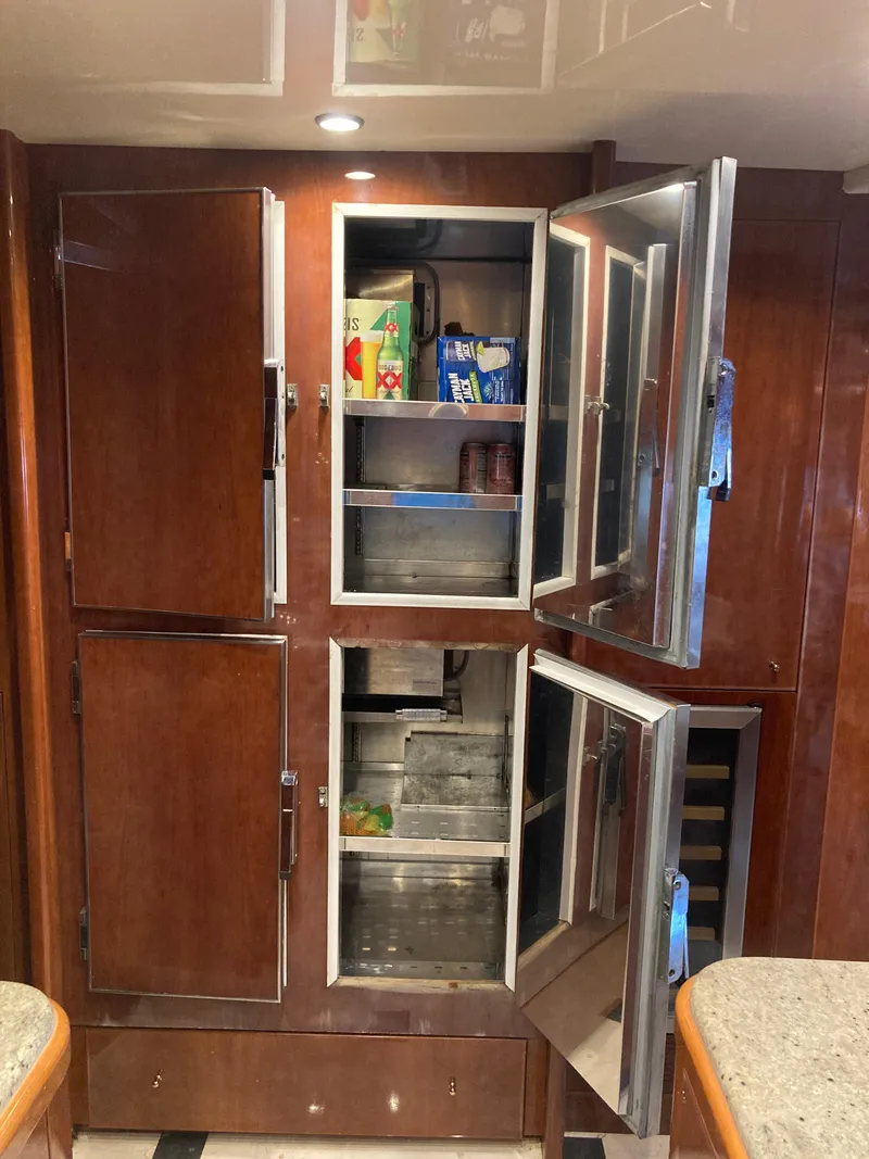 Slide: The Image of Interior of 2005 Azimut 80 Carat yacht with elegant wood finish and modern decor. - 47