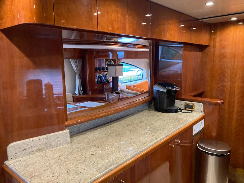 Slide: The Image of Luxury yacht Azimut 80 Carat 2005 interior with glassware cabinet and wine cooler. - 51