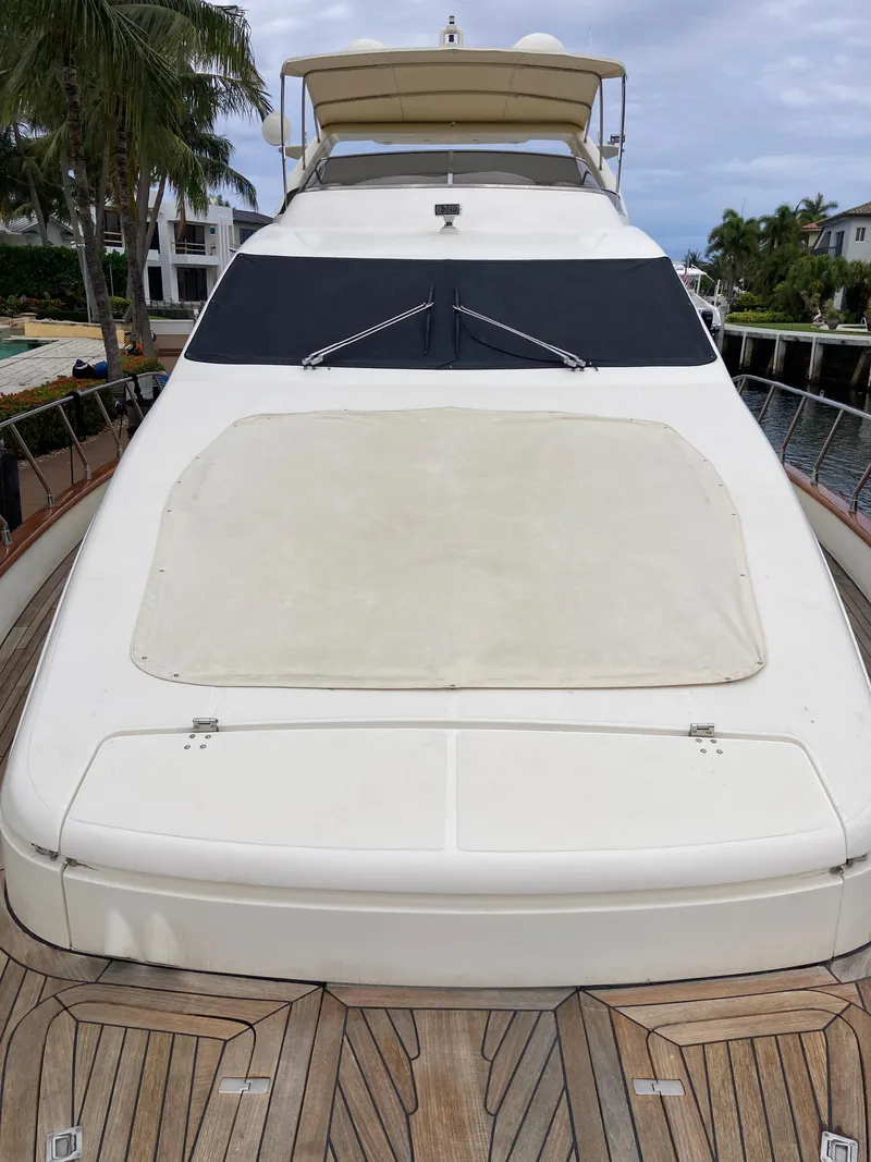 Slide: The Image of 2005 Azimut 80 Carat yacht with spacious deck and sleek design. - 28