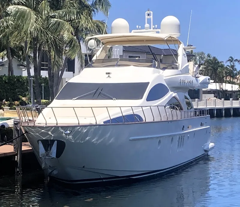 Slide: The Image of 2005 Azimut 80 Carat yacht docked by palm trees, sunny day. - 3