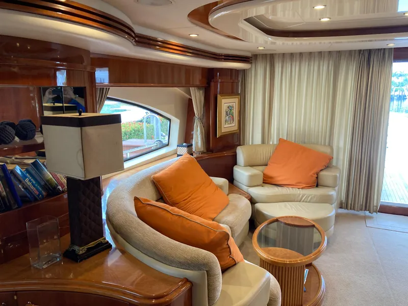 Slide: The Image of Luxurious interior of 2005 Azimut 80 Carat yacht with plush seating and orange cushions. - 39