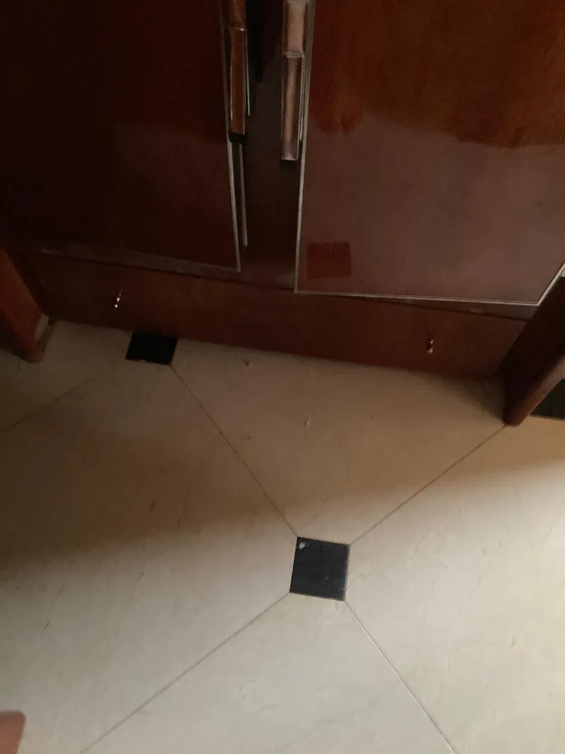 Slide: The Image of Luxurious interior of a 2005 Azimut 80 Carat yacht with elegant wood finishes. - 45