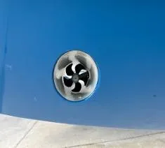 Slide: The Image of Close-up of a 2022 Yellowfin 39 Offshore boat's blue hull with a thruster. - 12