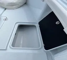 Slide: The Image of 2022 Yellowfin 39 Offshore boat storage compartments, open and ready for use. - 18