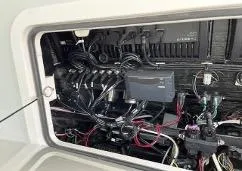 Slide: The Image of Electrical wiring inside a 2022 Yellowfin 39 Offshore boat compartment. - 25
