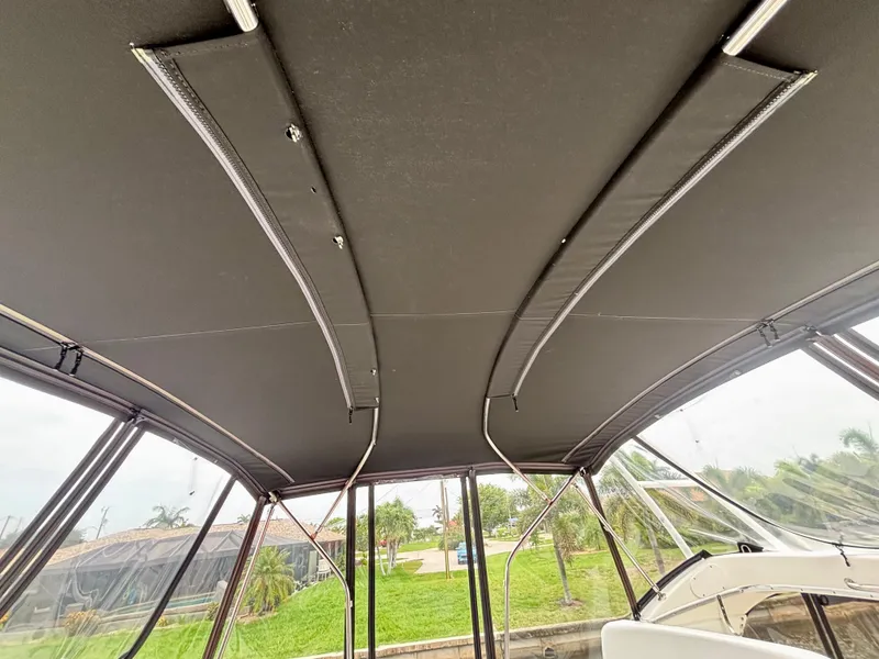 Slide: The Image of 2005 Silverton 39 Motor Yacht canopy with sleek design and sturdy support poles. - 41