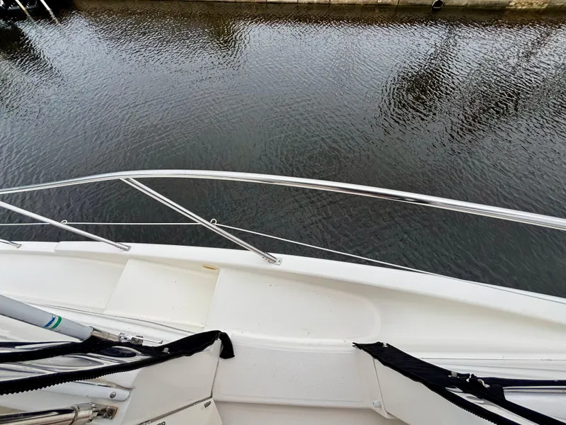 Slide: The Image of 2005 Silverton 39 Motor Yacht bow overlooking calm water. - 44