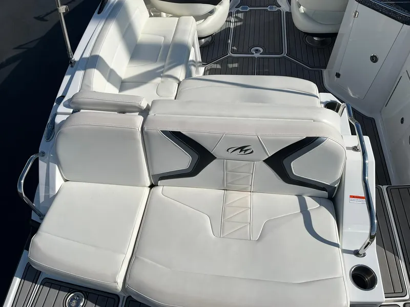 Slide: The Image of Luxury seating on a 2015 Monterey M4 boat with white upholstery. - 22