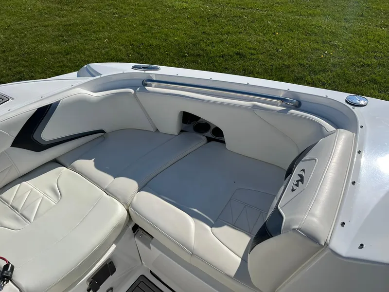 Slide: The Image of 2015 Monterey M4 boat interior with white leather seating and sleek design. - 29