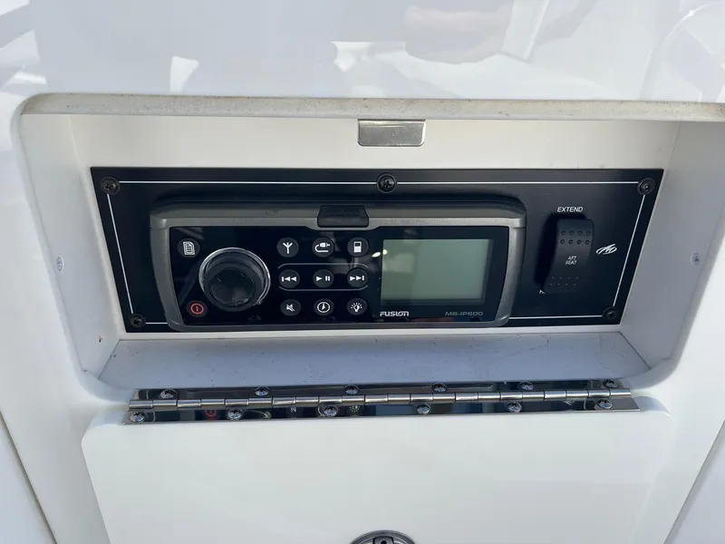 Slide: The Image of 2015 Monterey M4 boat stereo system with control panel and display. - 35