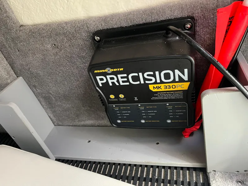 Slide: The Image of Minn Kota Precision MK 330PC charger installed in a 2015 Monterey M4 boat. - 37