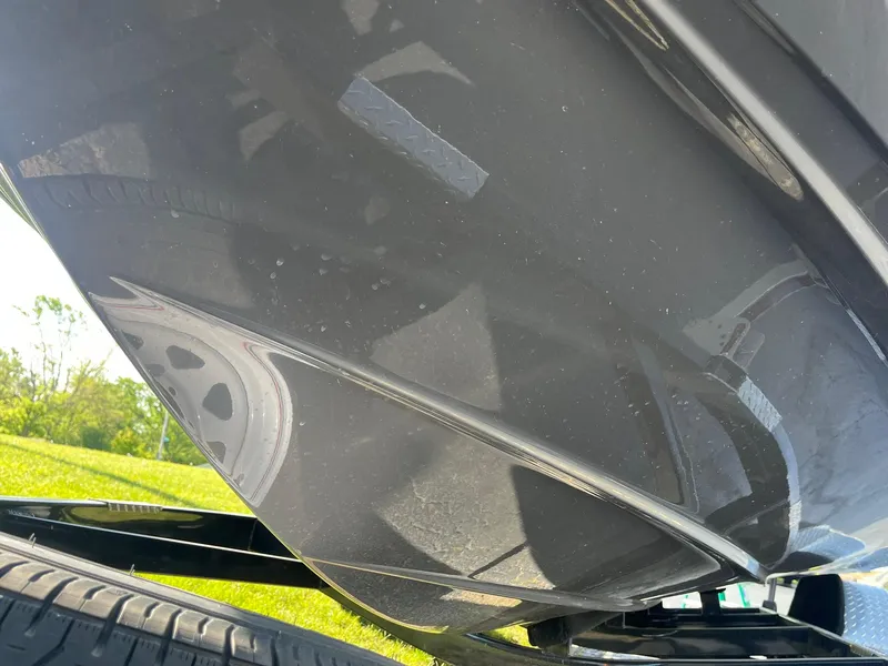 Slide: The Image of Underneath view of a 2015 Monterey M4 boat on a trailer. - 8