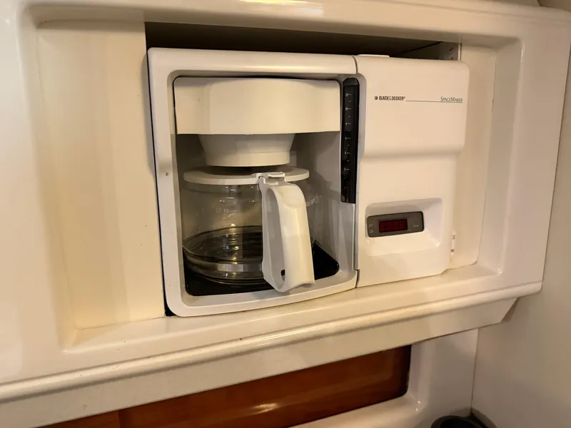 Slide: The Image of Built-in coffee maker on a 2003 Monterey 302 Cruiser yacht. - 30