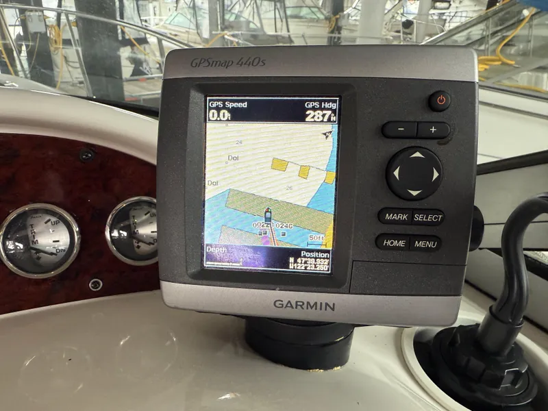Slide: The Image of Garmin GPSmap 540s on 2003 Monterey 302 Cruiser dashboard, displaying navigation map. - 7