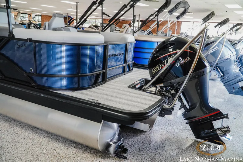 Slide: The Image of 2025 Bennington 23SSR pontoon boat with Yamaha outboard at Lake Norman Marina. - 3