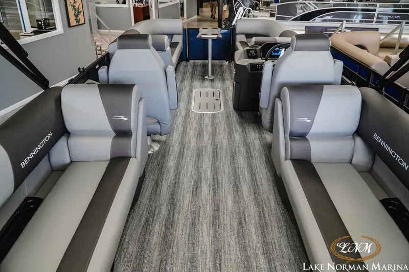 Slide: The Image of 2025 Bennington 23SSR pontoon boat interior with luxurious seating and modern design. - 5