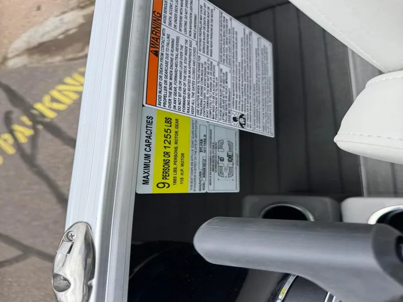 Slide: The Image of 2024 Sylvan Mirage 822 LZ capacity label, maximum 9 persons or 1,255 lbs. - 21