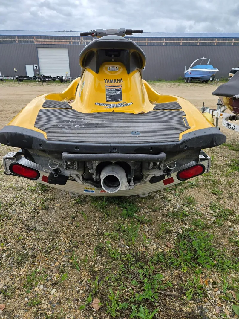 Slide: The Image of Yellow 2013 Yamaha VX1800 jet ski on a trailer, rear view. - 6