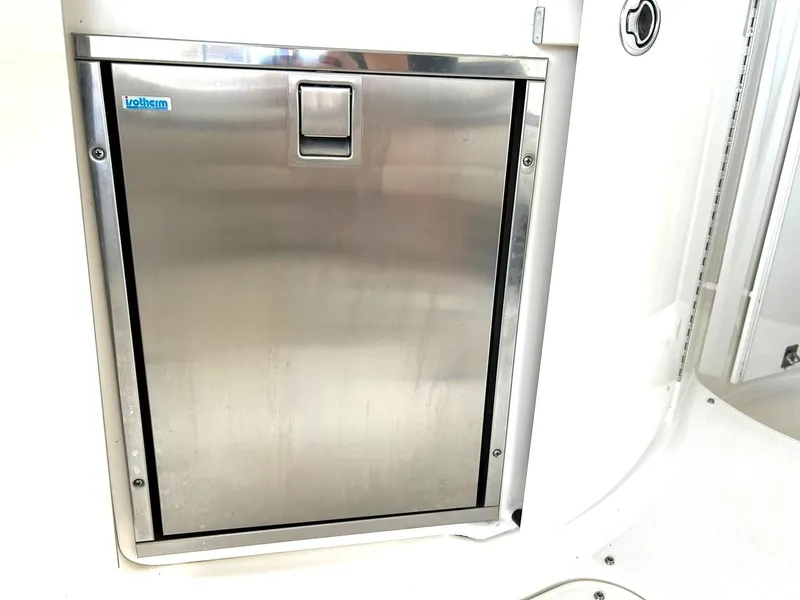 Slide: The Image of Stainless steel cabinet door on 2009 Chaparral 350 Signature boat. - 36