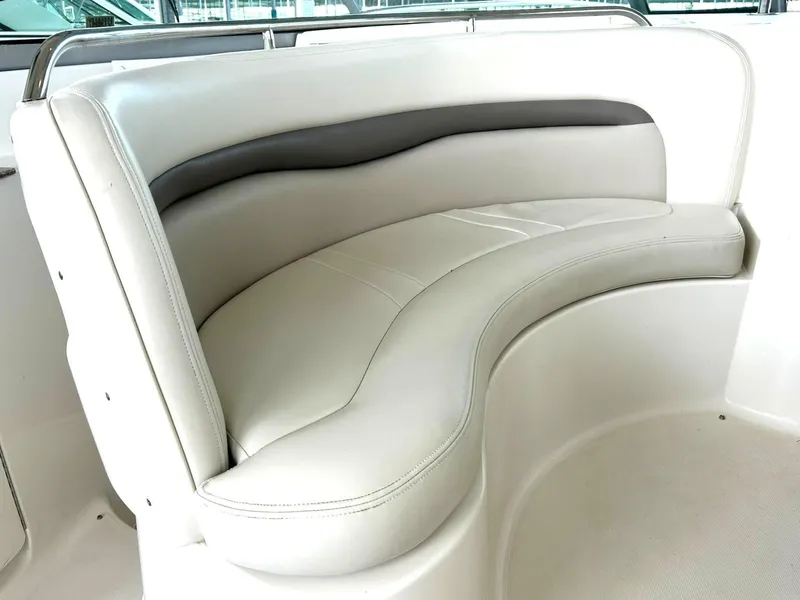 Slide: The Image of 2009 Chaparral 350 Signature boat interior with curved white leather seating. - 38
