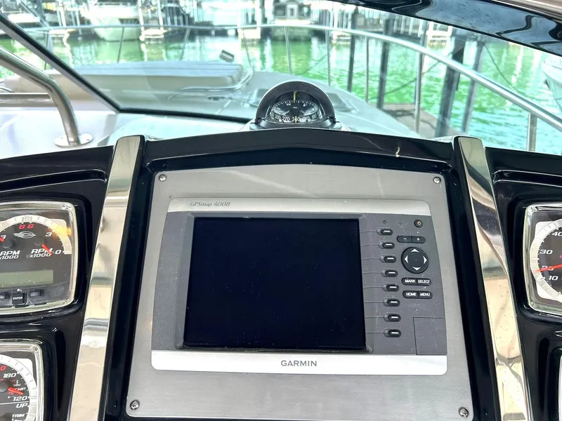 Slide: The Image of Control panel of a 2009 Chaparral 350 Signature boat with Garmin navigation system. - 45