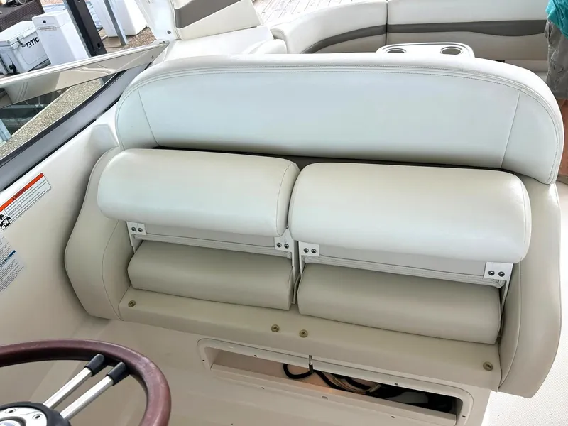 Slide: The Image of 2009 Chaparral 350 Signature boat interior with white leather seating. - 48