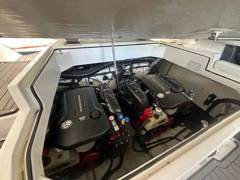 Slide: The Image of 2022 Cobalt A36BR boat engine compartment with dual engines. - 13