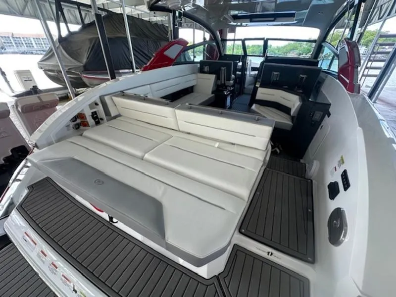 Slide: The Image of 2022 Cobalt A36BR boat interior with spacious seating and modern design. - 14