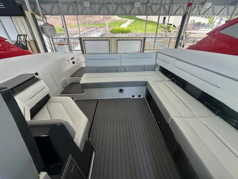 Slide: The Image of 2022 Cobalt A36BR boat interior with spacious seating and modern design. - 17