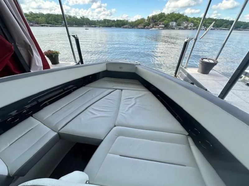 Slide: The Image of Luxurious interior of 2022 Cobalt A36BR boat with waterfront view. - 21