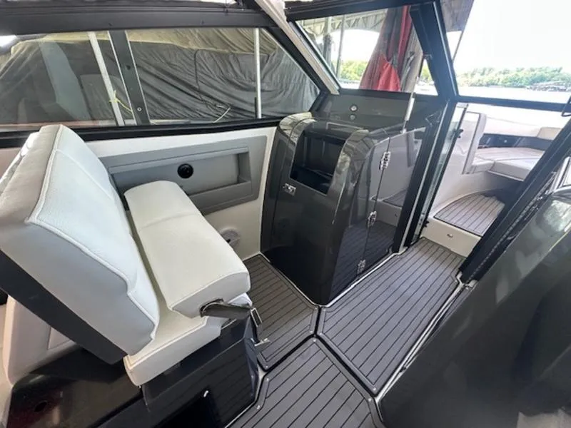 Slide: The Image of Interior of 2022 Cobalt A36BR boat with sleek seating and modern design. - 22