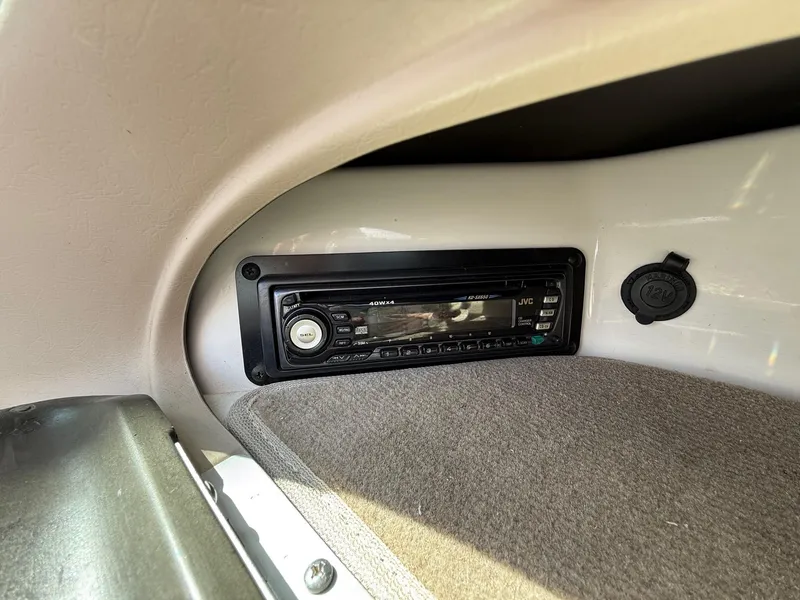 Slide: The Image of JVC stereo system in a 2000 Chaparral 196 SSi boat interior. - 12