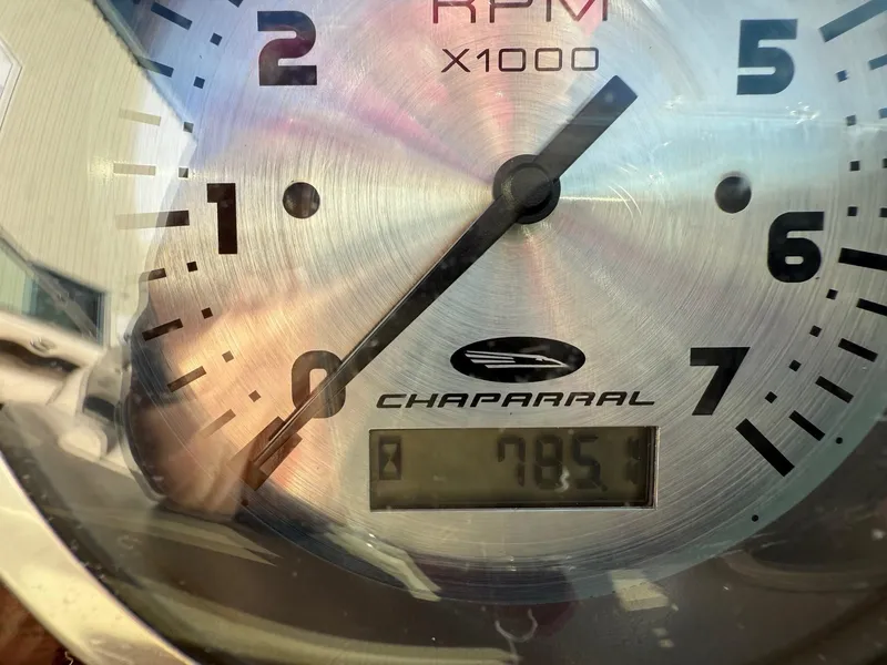Slide: The Image of Close-up of Chaparral 196 SSi 2000 RPM gauge displaying 785.1 hours. - 16