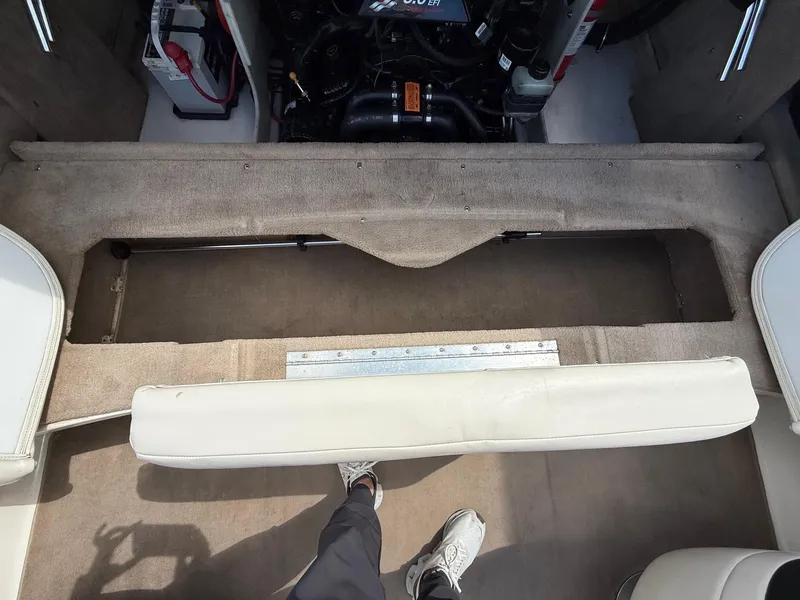 Slide: The Image of Interior view of a 2000 Chaparral 196 SSi boat showing engine compartment and seating area. - 20