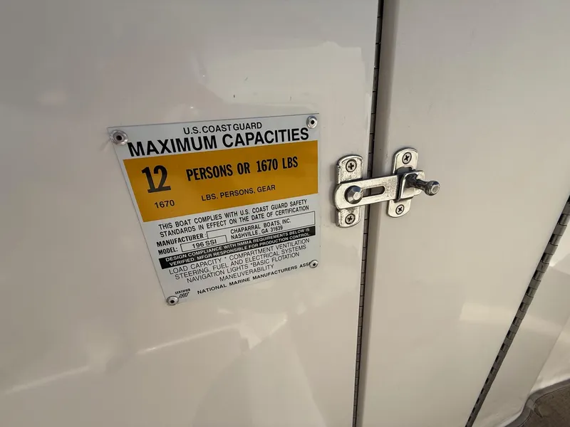 Slide: The Image of Capacity label on 2000 Chaparral 196 SSi boat, maximum 12 persons or 1670 lbs. - 23