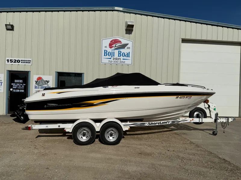 Slide: The Image of 2000 Chaparral 196 SSi boat on trailer outside Boji Boat Brokers building. - 26