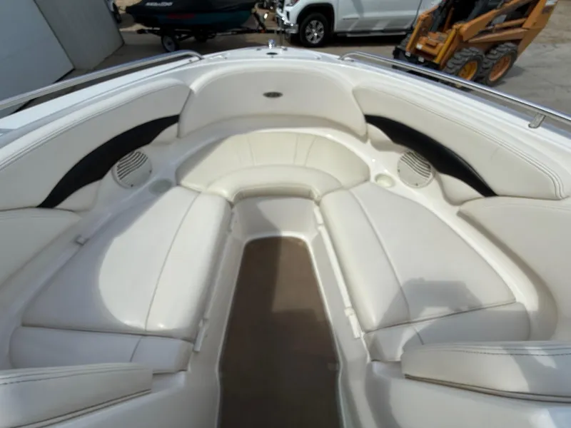 Slide: The Image of Interior view of 2000 Chaparral 196 SSi boat with white seating and speakers. - 8