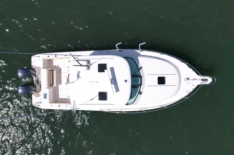 Slide: The Image of Aerial view of 2015 Pursuit 345 Offshore boat on water. - 11