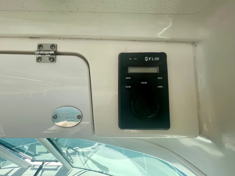 Slide: The Image of FLIR control panel on 2015 Pursuit 345 Offshore boat interior. - 38