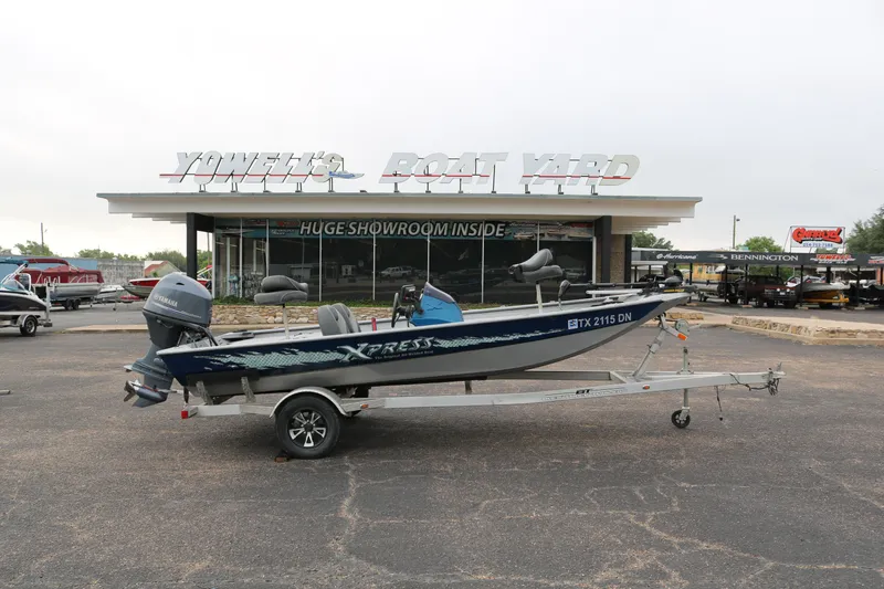 Slide: The Image of Xpress XP7 2016 boat on trailer outside dealership showroom. - 0