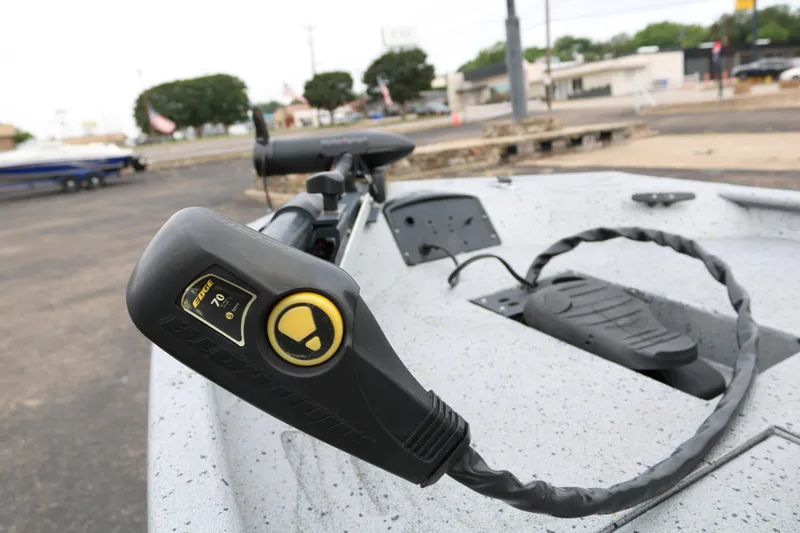 Slide: The Image of Close-up of 2016 Xpress XP7 boat control panel in a parking area. - 11