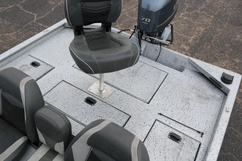 Slide: The Image of 2016 Xpress XP7 boat interior with seating and storage compartments. - 20