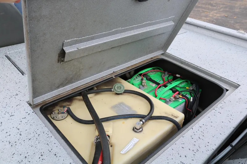 Slide: The Image of Open compartment of 2016 Xpress XP7 showing battery and wiring setup. - 28