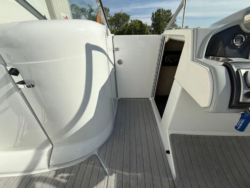 Slide: The Image of 2009 Formula 240 Bowrider interior with sleek design and modern dashboard. - 13