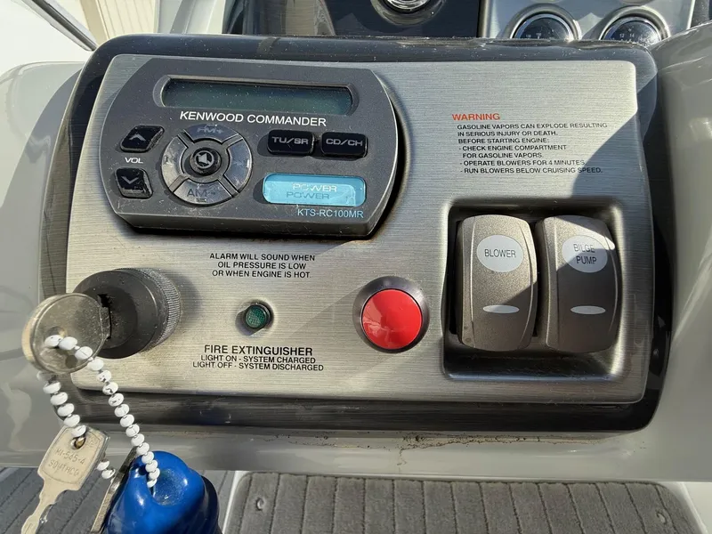 Slide: The Image of Control panel of a 2009 Formula 240 Bowrider boat with Kenwood Commander. - 21